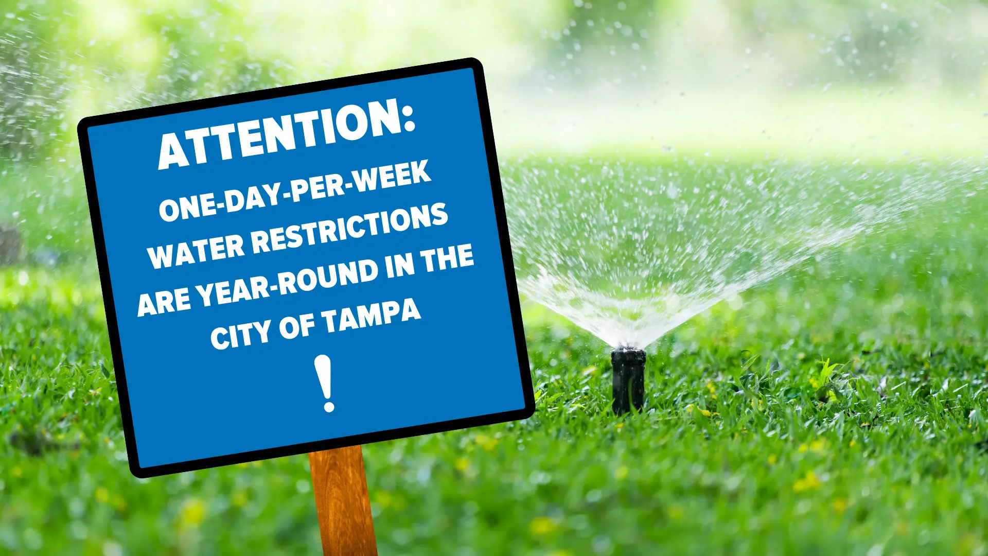 Blue sign warning residents water restrictions are year round in Tampa