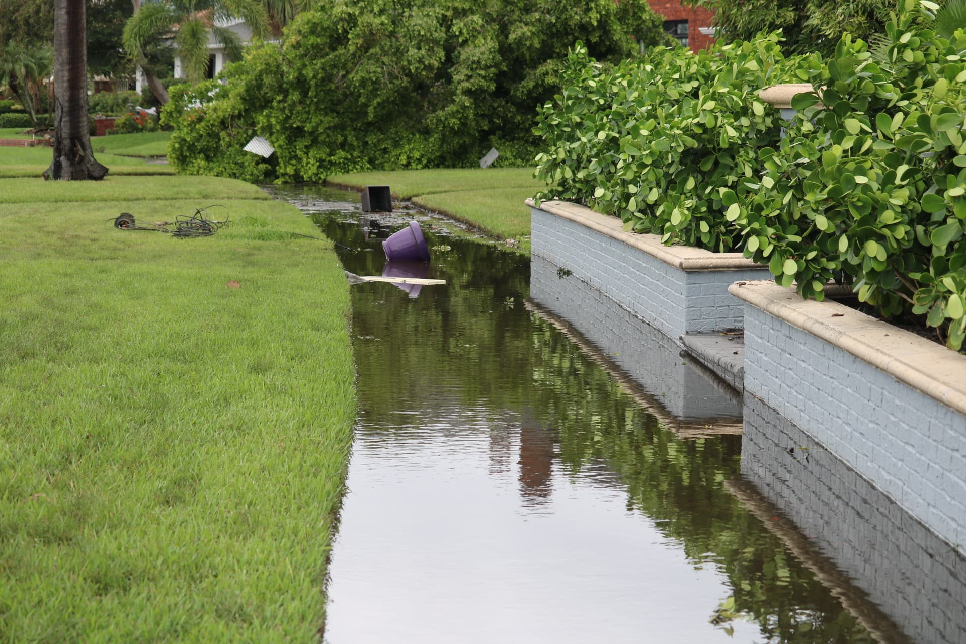 A sidewalk flooded
