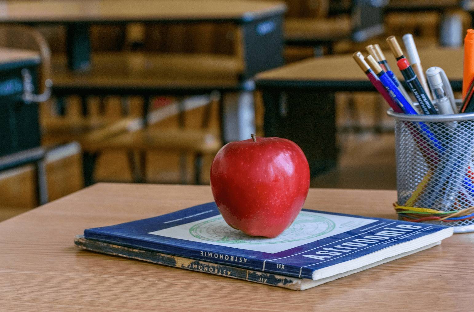 Apple on a teacher desk