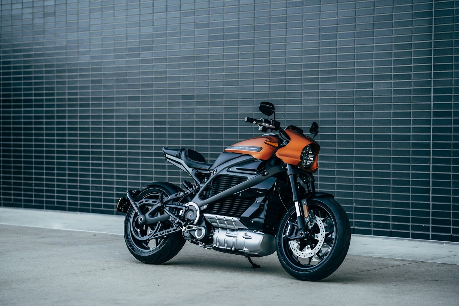 Motorcycle on an open road under a blue sky